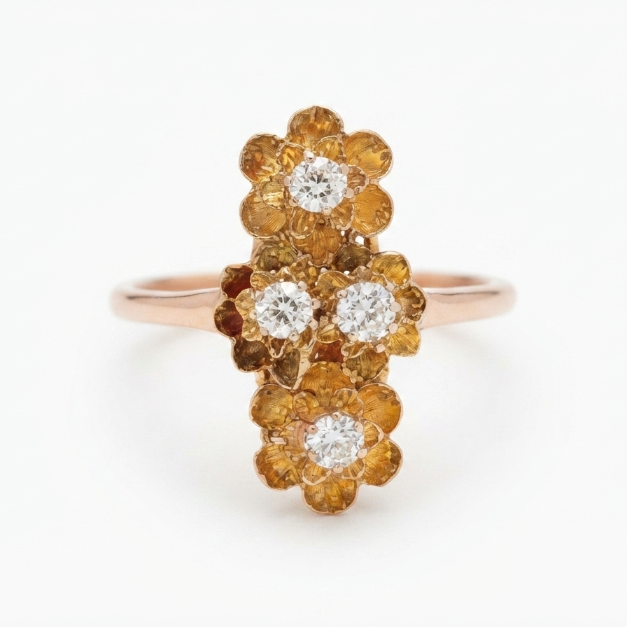 A rose gold ring featuring a vertical cluster of flower-shaped settings with round yellow gemstones and three clear round diamonds, set against a plain white background.