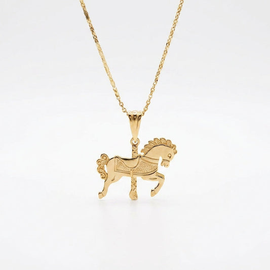 A gold-tone necklace featuring a detailed horse-shaped pendant, shown against a clean white background.